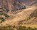 high-angle-shot-of-the-beautiful-fields-and-mountains-captured-in-pisac-peru